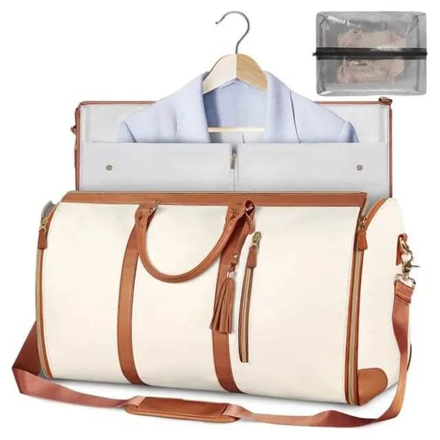 VoyageVault Carry-On foldable duffel in white PU material with brown straps, featuring a travel suit compartment and additional accessories